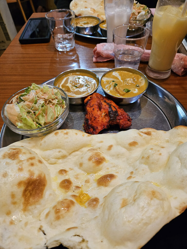 This picture was taken in Rojal restaurant. I am eating salad, Naan, tandoori chicken, chicken curry, and butter chicken curry I took this picture with my study buddy at Coffee Aristocrat Edinburgh. This is a chocolate parfait! 